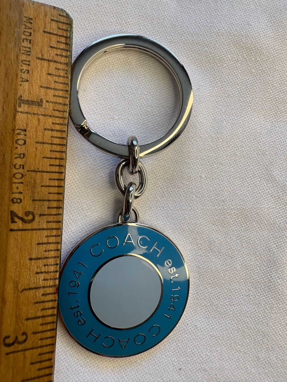 Coach Silver-Tone Keyring with Blue Enamel Disc